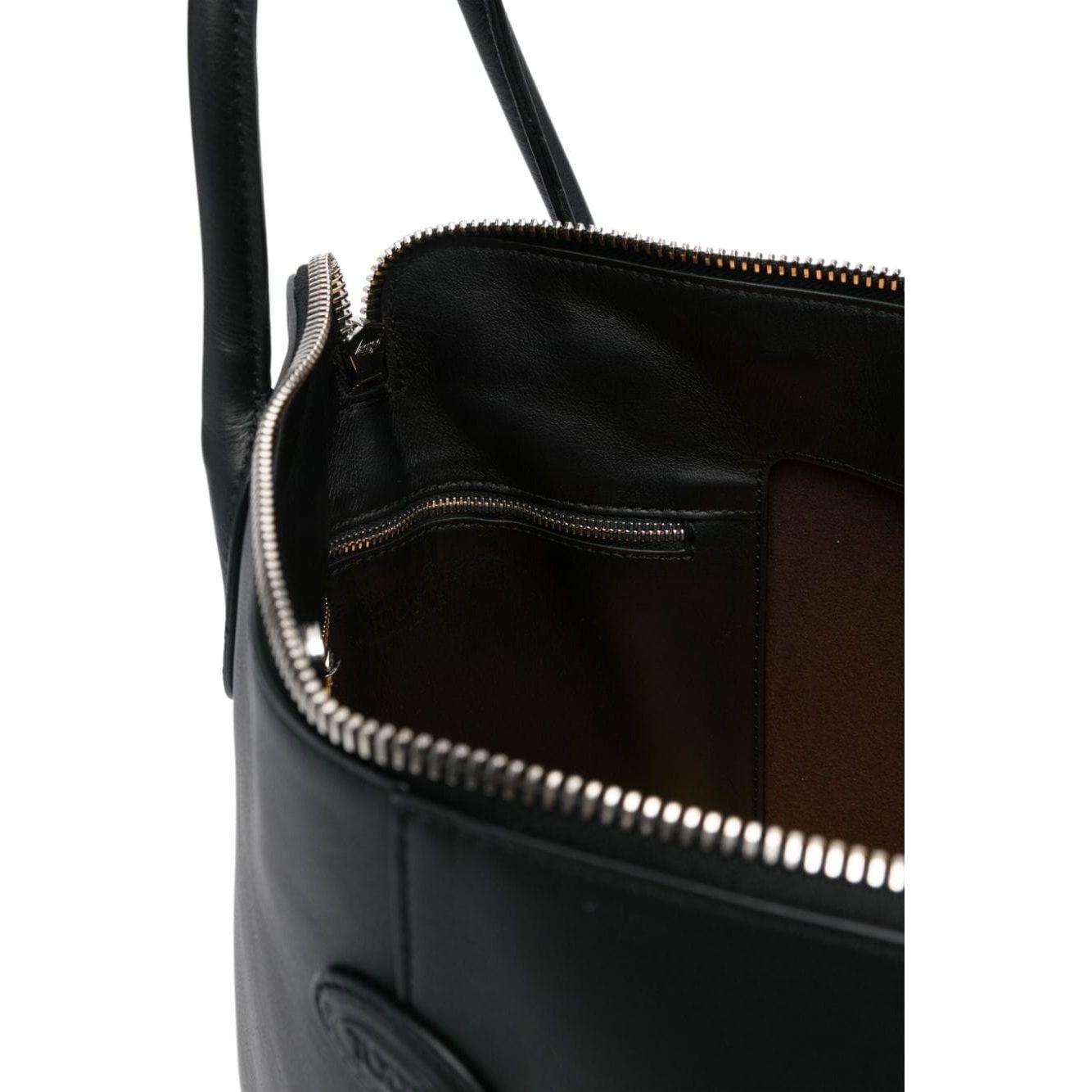 Front view with bag zipped and handles upright.