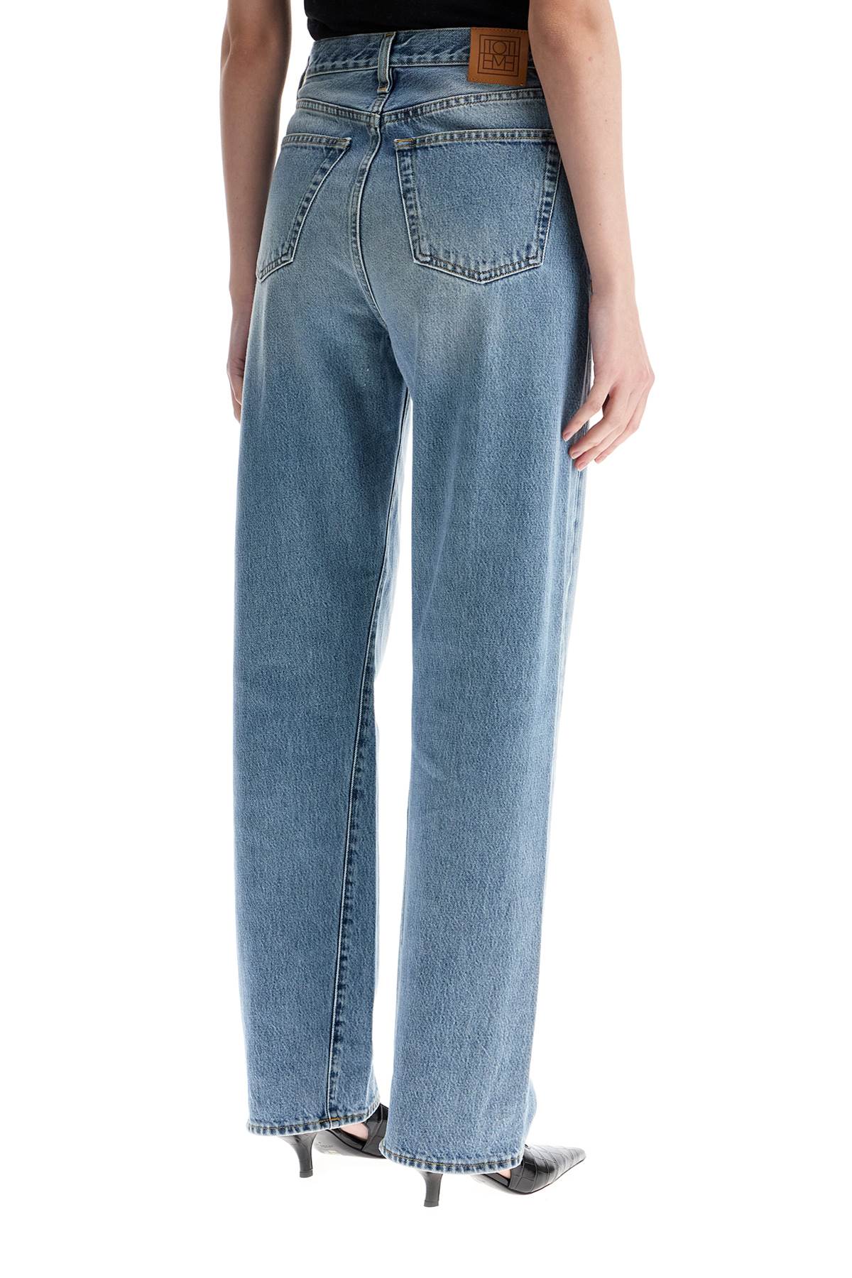 Toteme wide leg organic cotton jeans in worn blue with twisted seams Jeans Toteme