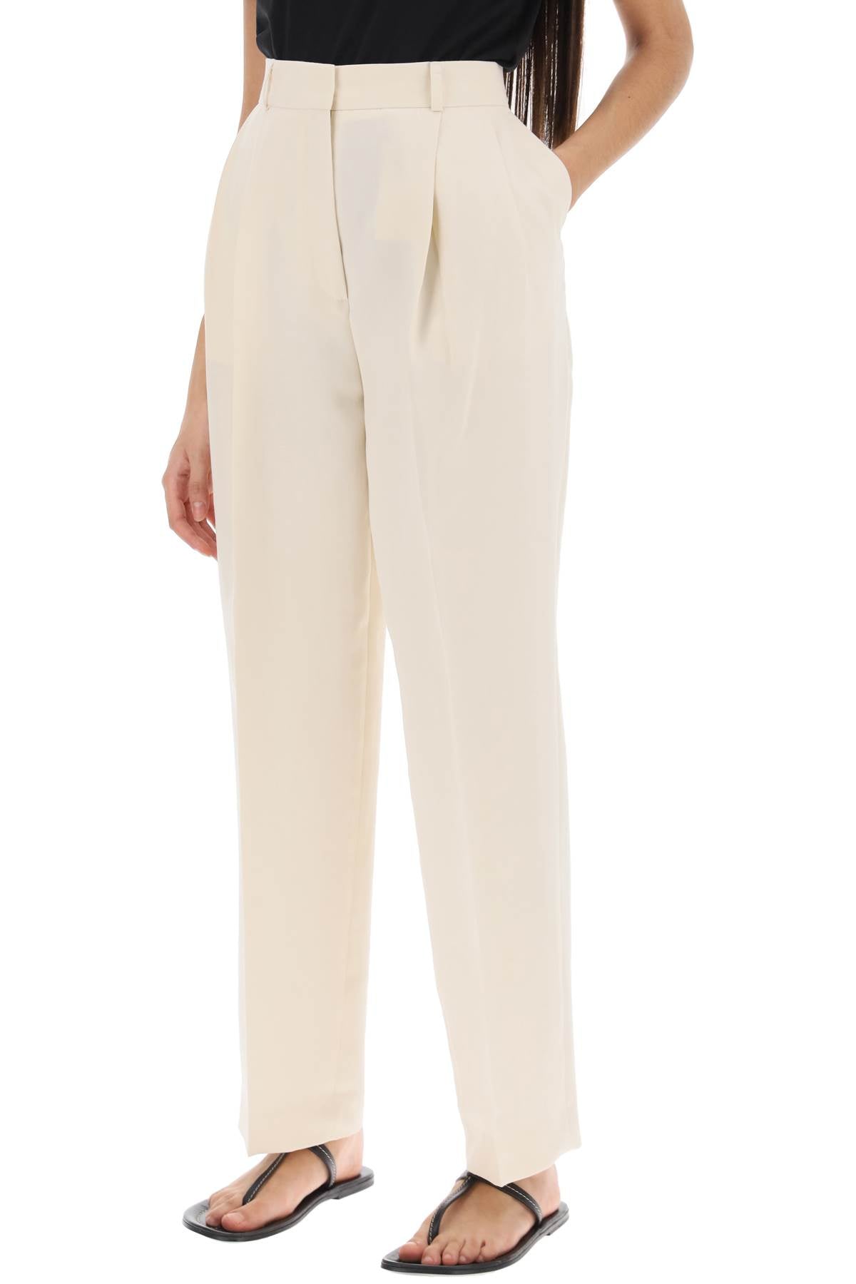 Toteme double-pleated viscose trousers