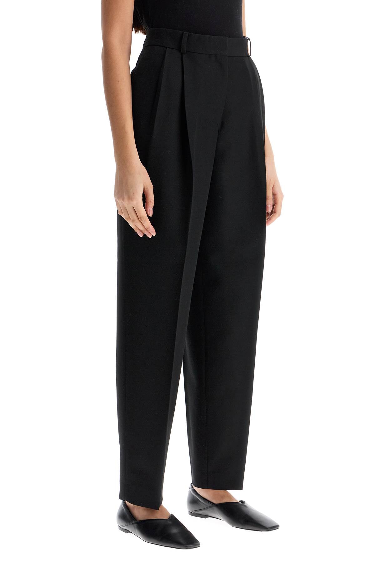 Toteme tailored high-waisted wide-leg pants black sustainable materials Trousers Toteme