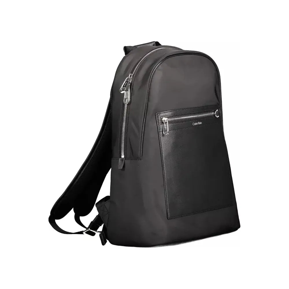 Front view with bag zipped and handles upright.