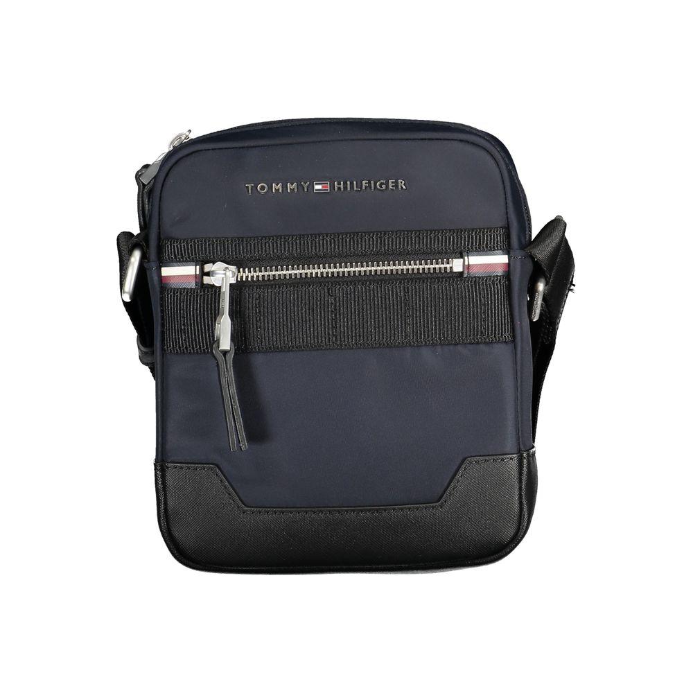 Front view with bag zipped and handles upright.