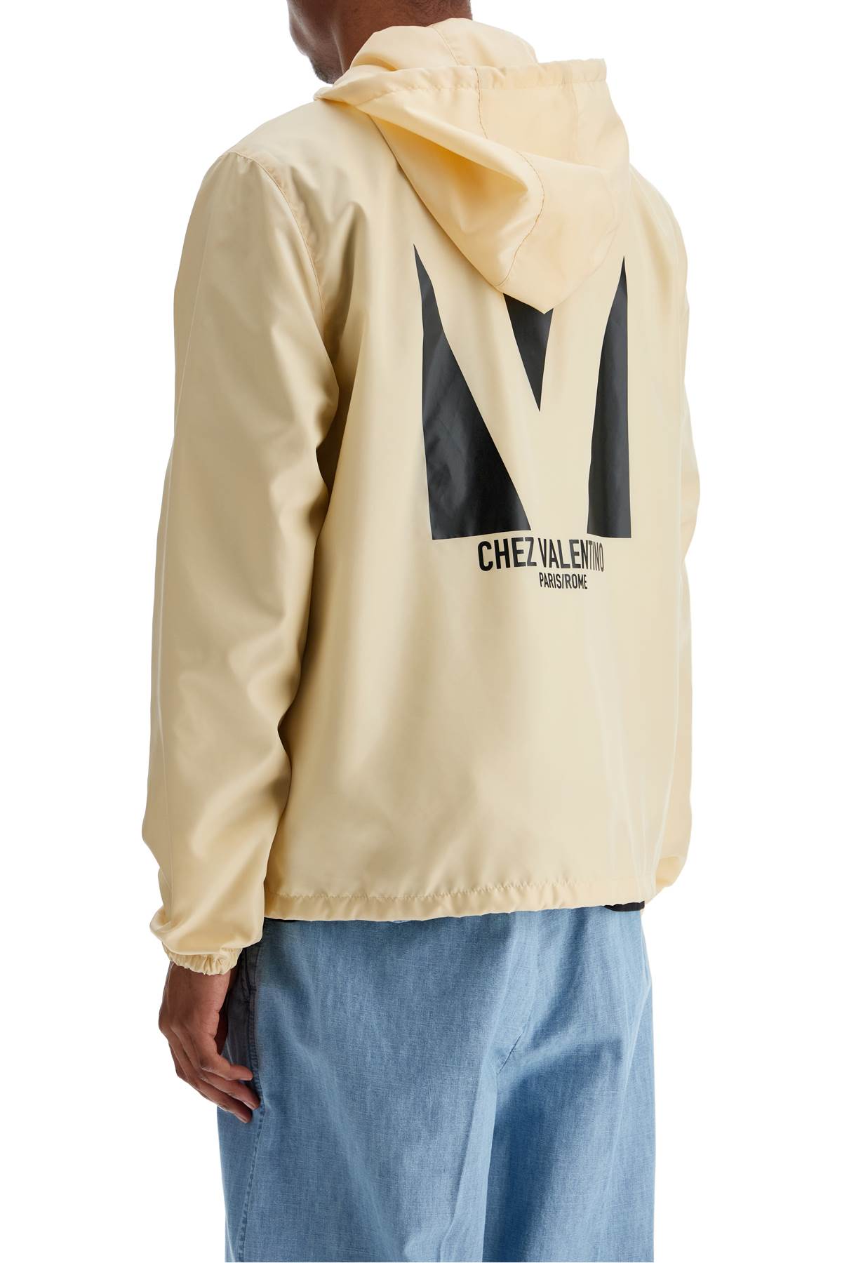 Valentino Garavani beige hooded windbreaker in logoed polyamide Jackets Valentino Garavani